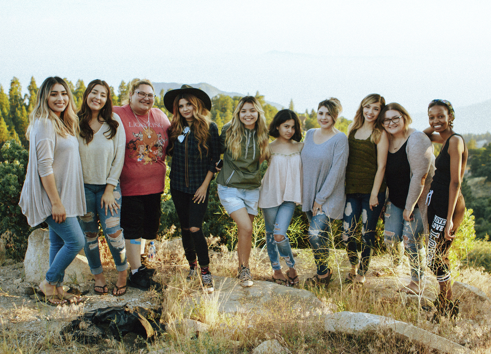 Group of happy people at an outdoor retreat.